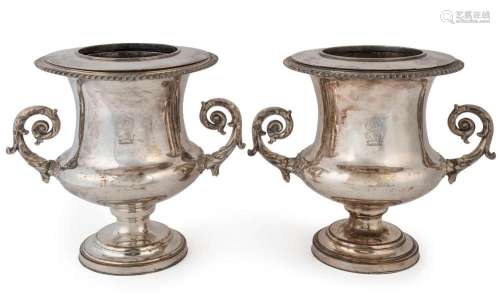A pair of antique silver plated champagne ice buckets with e...