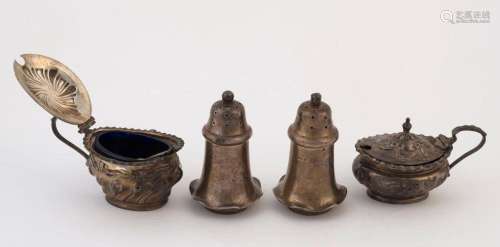 A pair of sterling silver mustard pots (one with blue glass ...