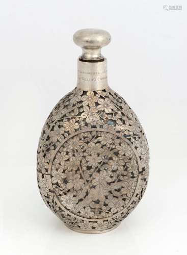 A Chinese silver mounted whisky decanter, early 20th century...