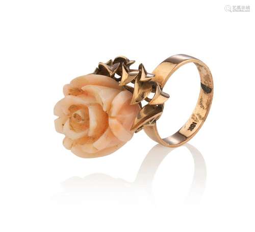 An antique English rose gold ring set with carved coral rose...