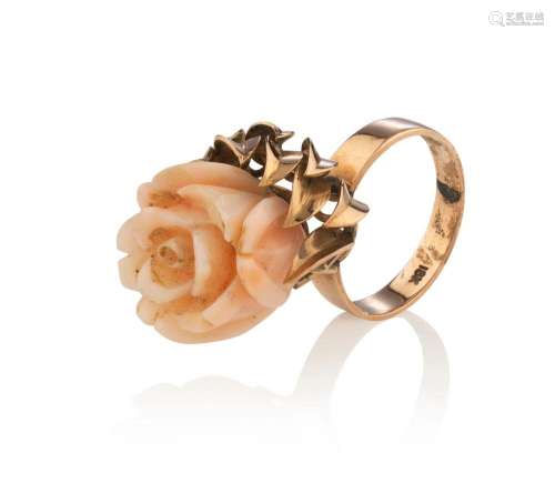 An antique English rose gold ring set with carved coral rose...