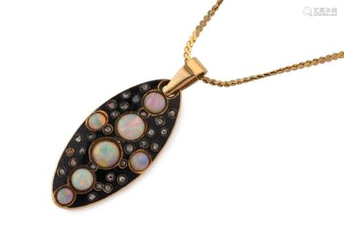 An antique yellow gold oval pendant set with cabochon opals ...