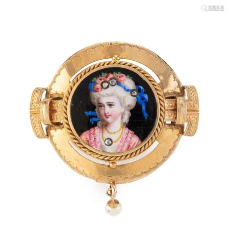 An antique yellow gold brooch with fine enamel portrait of a...