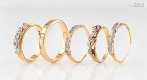 Five vintage and antique 18ct yellow gold rings set with dia...