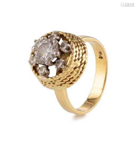 An 18ct yellow gold ring set with an impressive brilliant cu...