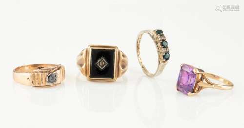 Four assorted rings. One 9ct rose gold and black onyx set wi...