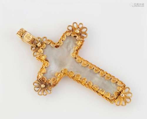 An ornate 18ct yellow gold mounted pearl shell crucifix pend...