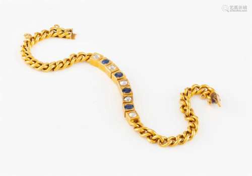 A vintage 18ct yellow gold bracelet set with sapphires and d...