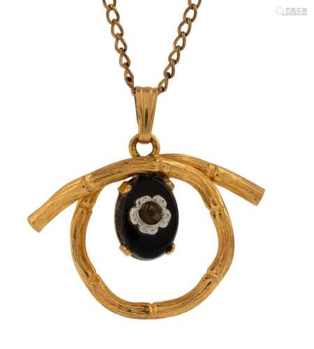 A yellow gold pendant on a fine 9ct gold chain, 20th century...