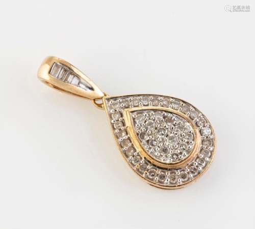 A 9ct yellow gold teardrop shaped pendant pave set with whit...