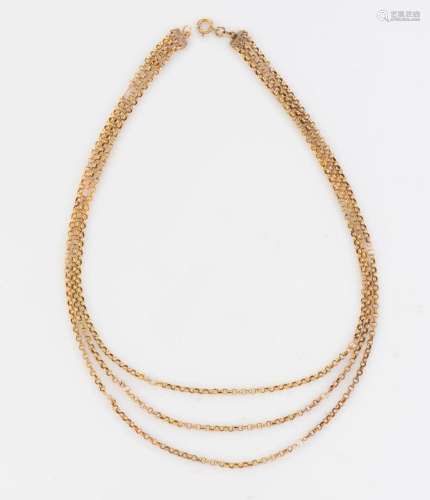 A three strand yellow gold necklace set with Baroque natural...