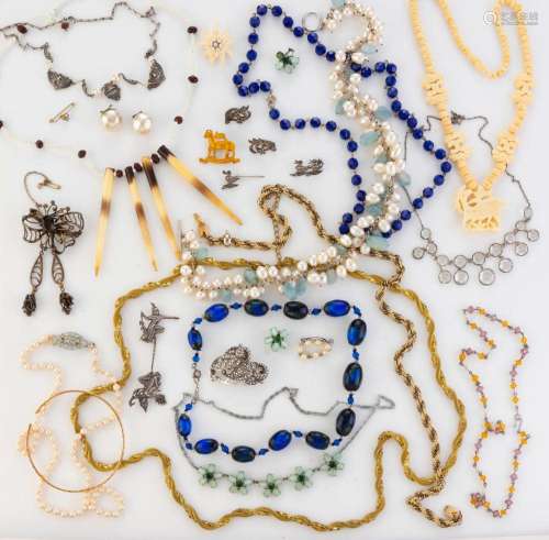 Twelve assorted vintage necklaces, earrings, brooches, bangl...
