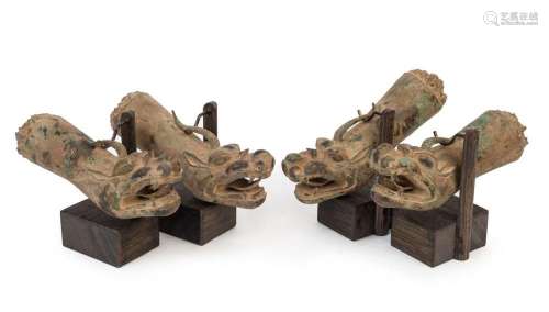 A set of four Chinese bronze dragon sedan chair handles, ear...