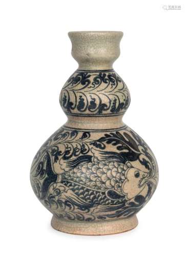 An antique Vietnamese porcelain double gourd vase with fish ...