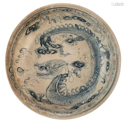An antique Vietnamese porcelain dragon bowl, possibly shipwr...