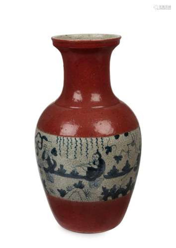 An antique Chinese vase, brick red ground with blue and whit...