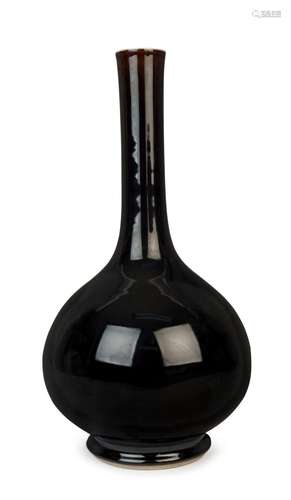 A Chinese jet black porcelain long neck vase, 19th/20th cent...