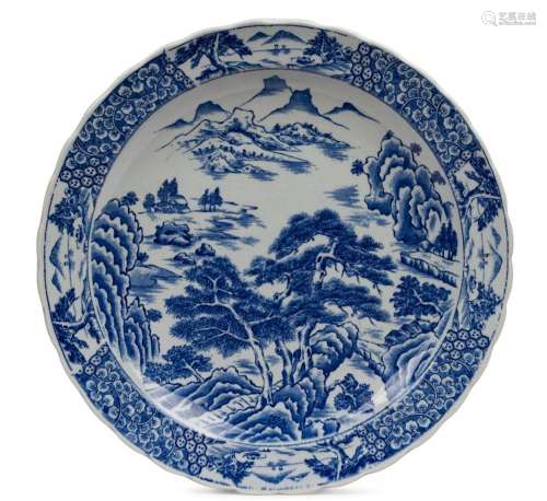 An antique Japanese Arita Ware blue and white charger with l...