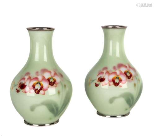 A pair of Japanese cloisonné vases with orchid decoration on...