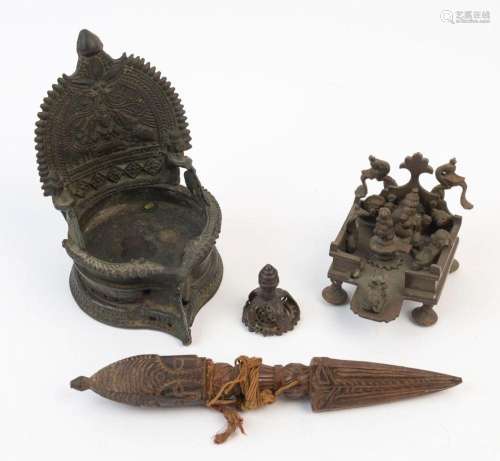 Tibetan phurba, bronze seal and two cast bronze ornaments, 1...