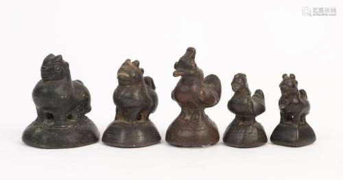Five assorted Burmese antique zoomorphic bronze opium weight...