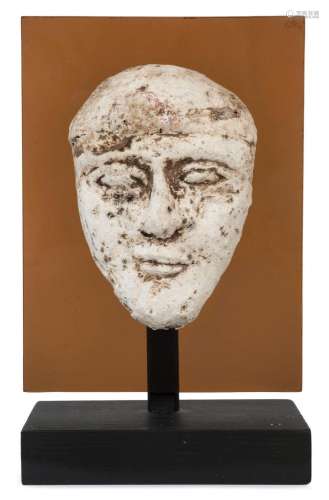 Egyptian male face mask, terracotta overlaid with plaster re...
