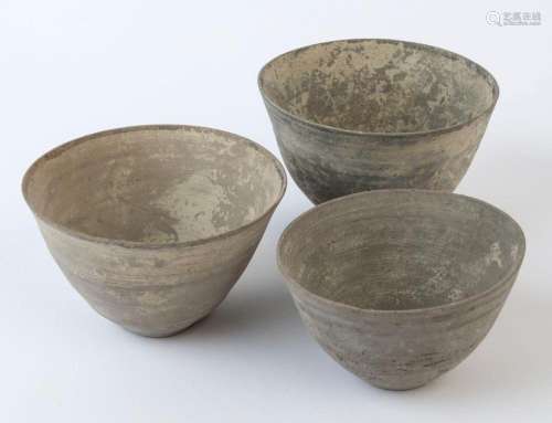 A group of three Indo-Persian pottery vessels with incised b...