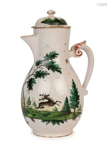 An antique French tin glazed earthenware coffee pot and cove...