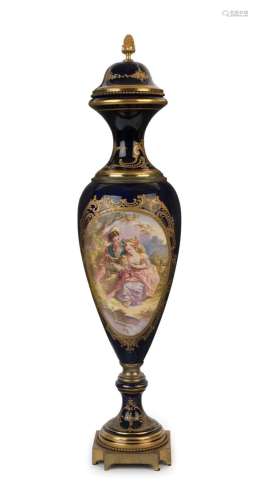 A French decorative blue porcelain mantel urn with ormolu mo...