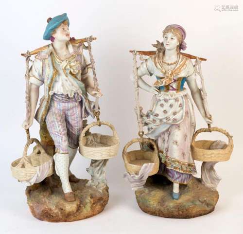 A pair of antique Continental porcelain statues of peasants,...