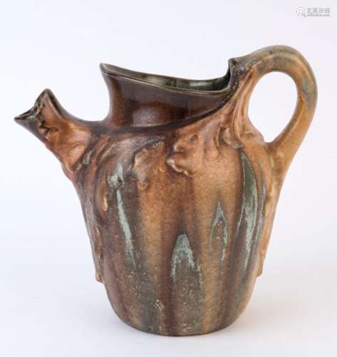 A Belgian brown glaze pottery jug with oak leaf decoration, ...