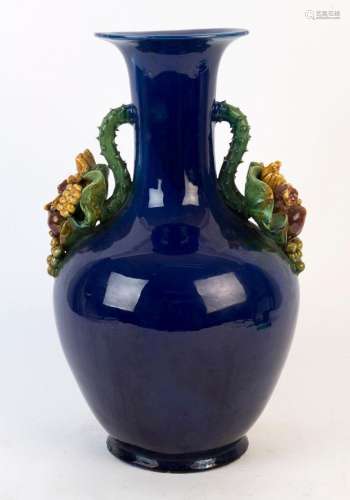 A blue porcelain vase with applied fruit handles, 20th centu...