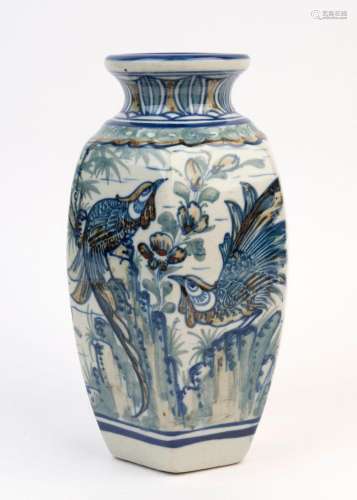 A Persian pottery vase adorned with birds and flowers, 20th ...