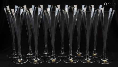 A set of twelve Continental glass champagne flutes, 20th cen...