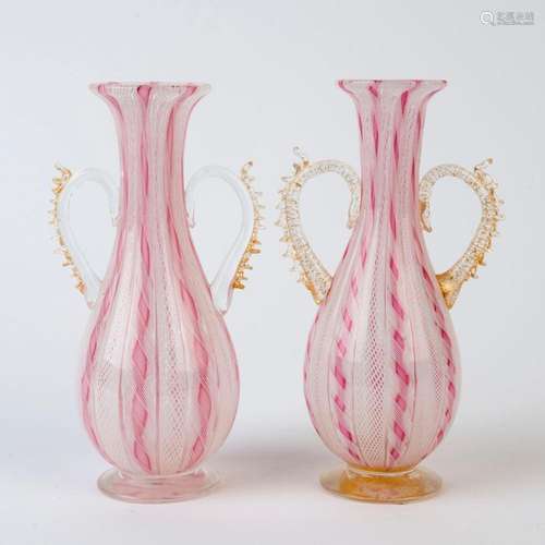 A near pair of pink and white latticino Murano glass vases, ...