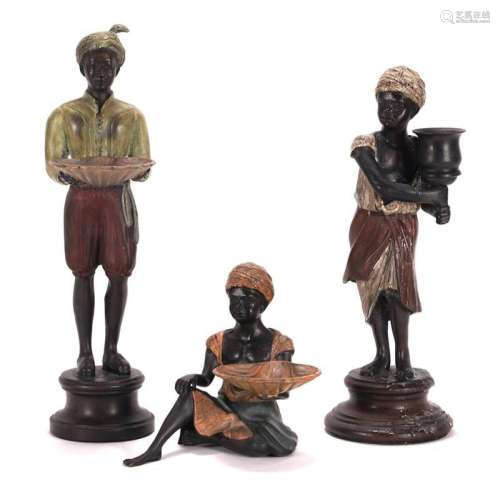 Three decorative figures