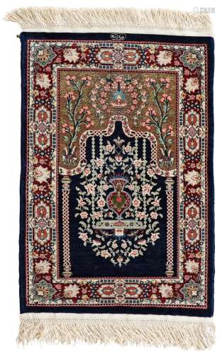 Signed silk Hereke Rug (10 x 10 knots per sqcm)