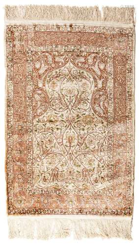 Signed Silk Hereke Rug with metal brocade (10 x 10 knots per...