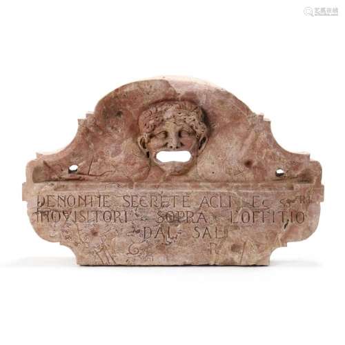 A Romanesque Style Carved Red Hardstone Bocche Di Leone (Lio...