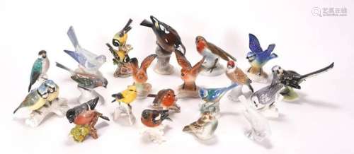 Twenty bird figurines