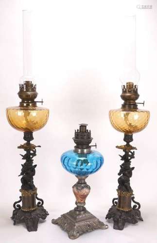 Pair of figural petroleum lamps
