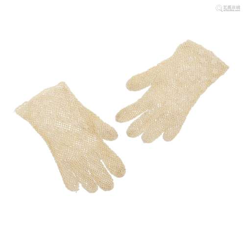 A PAIR OF RUTH BADER GINSBURG CREAM LACE GLOVES. A pair of c...