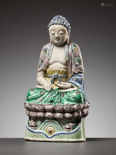 AN EXCEEDINGLY RARE FAMILLE VERTE BISCUIT FIGURE OF BUDDHA, ...