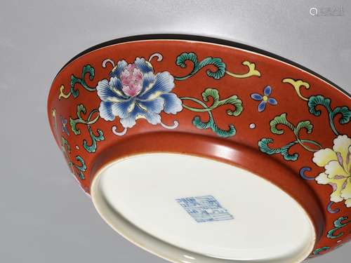 A FALANGCAI 'PEONIES AND WUFU' CORAL-GROUND DISH, QIANLONG M...