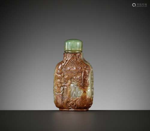 A CARVED CELADON AND RUSSET JADE SNUFF BOTTLE, MASTER OF THE...