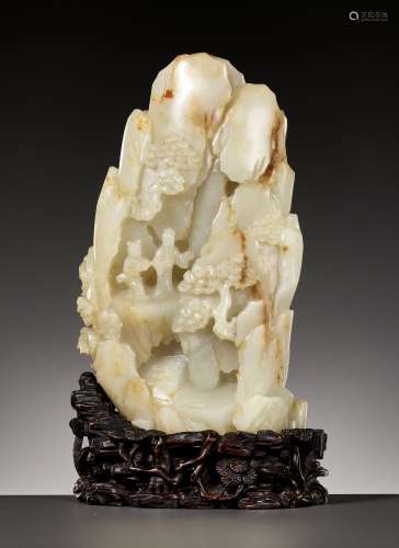 AN IMPORTANT AND RARE PALE CELADON AND RUSSET JADE MOUNTAIN,...