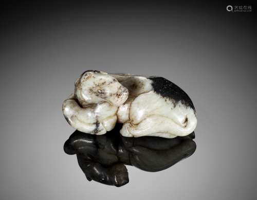 A GRAY AND BLACK NEPHRITE JADE FIGURE OF A HORSE, MING DYNAS...