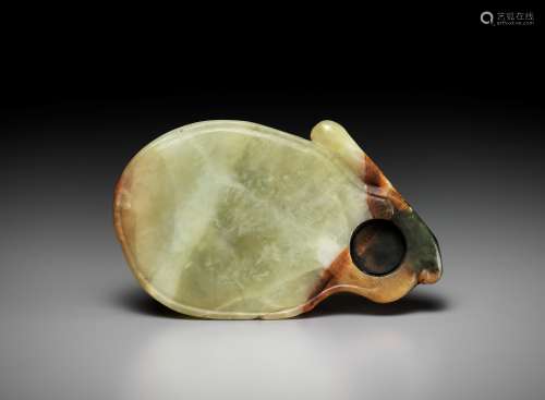 A YELLOW AND RUSSET JADE 'RABBIT' INKSTONE, EARLY QING DYNAS...