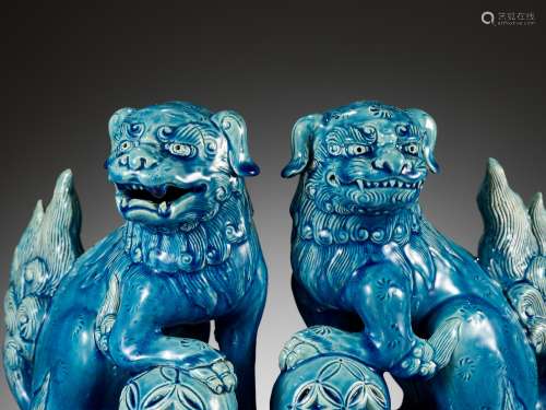 A PAIR OF TURQUOISE GLAZED BUDDHIST LIONS, QING DYNASTY