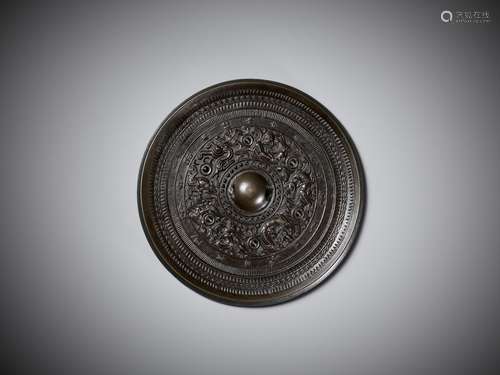 A 'MYTHICAL BEASTS' BRONZE MIRROR, HAN DYNASTY